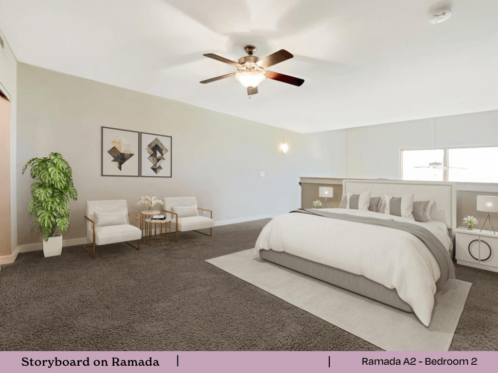 a bedroom with a bed and a ceiling fan