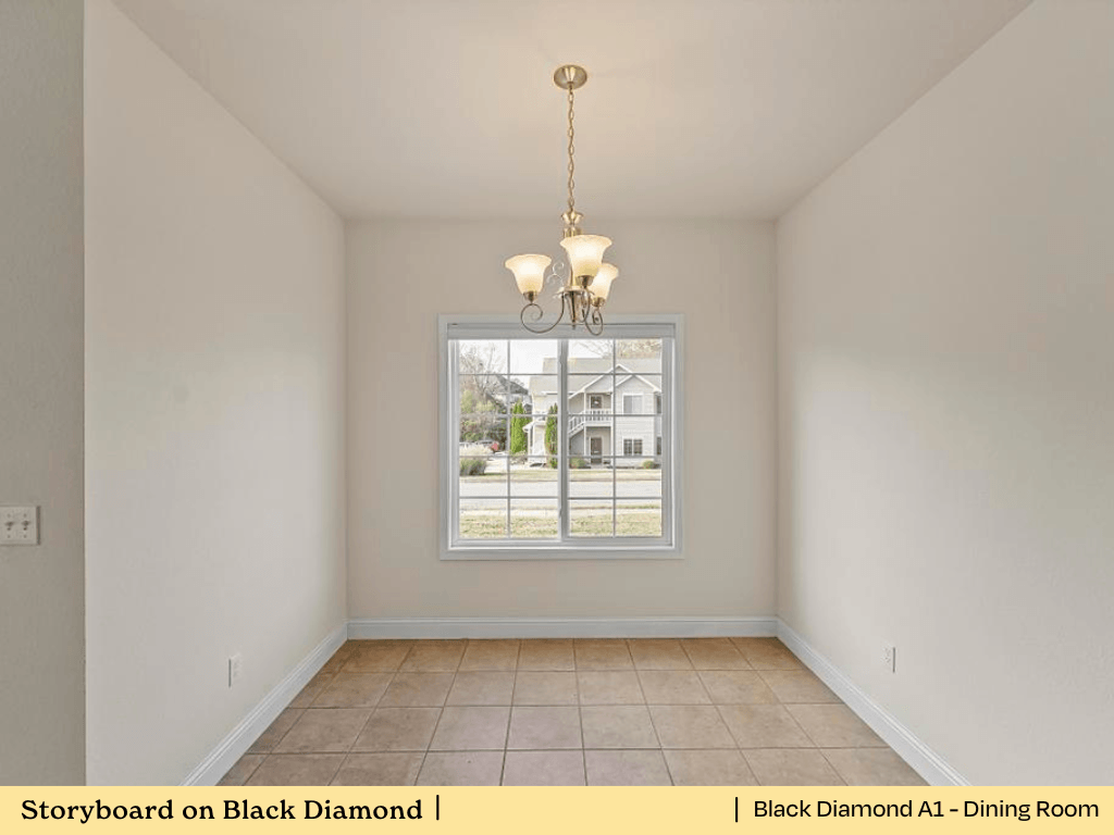 an empty dining room with a large window and tiled floors