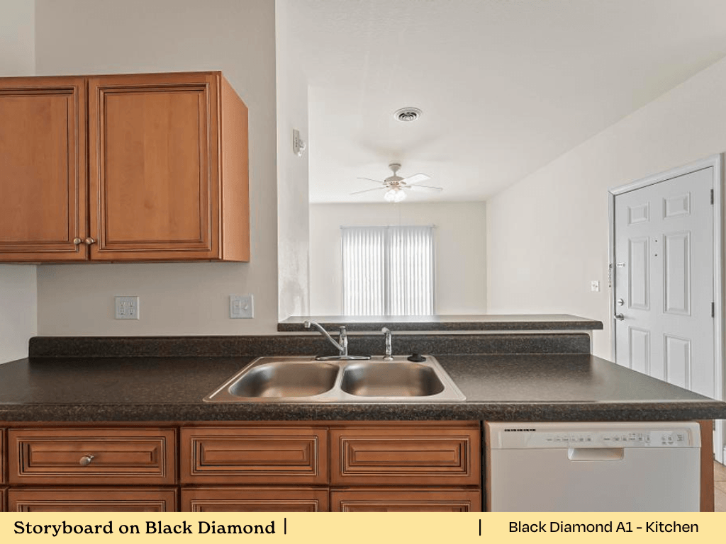 a kitchen with wooden cabinets and a sink