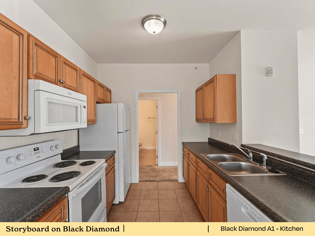 a kitchen with white appliances and wood cabinets