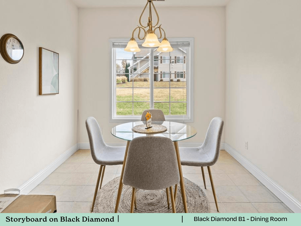 a dining room with a table and chairs and a window