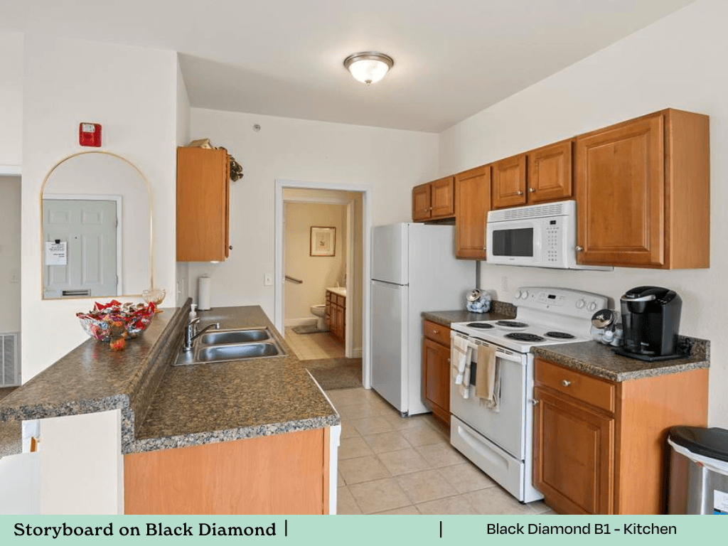 a kitchen with white appliances and granite counter tops