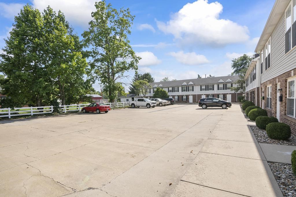 a parking lot in front of a building