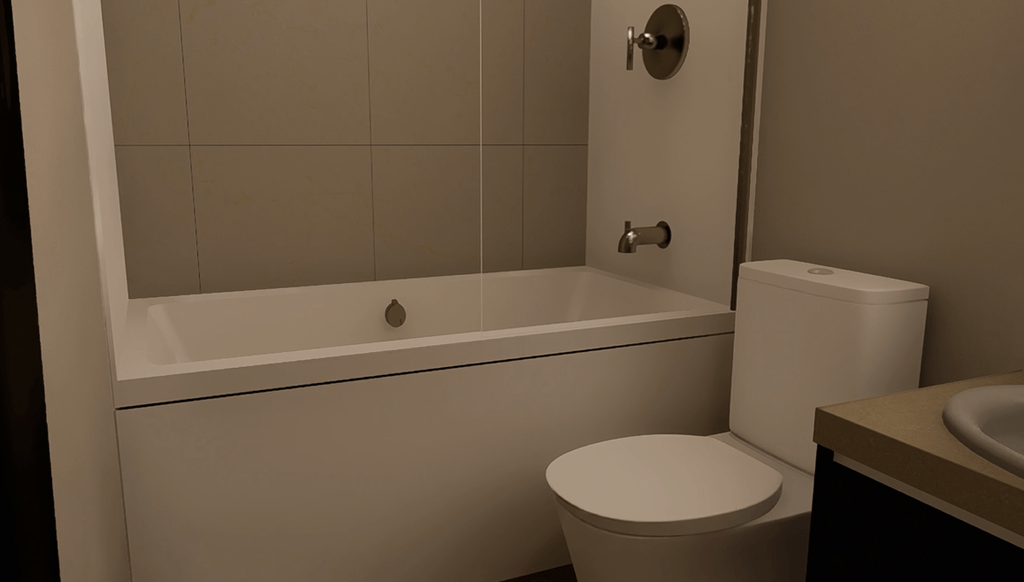 A white toilet sits next to a bathtub in a bathroom.