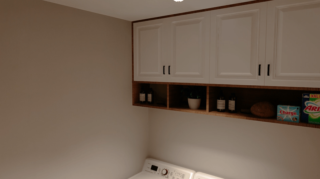 A white box of Charge AIR is on a shelf above a white device.