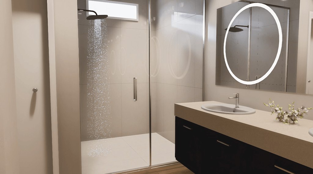 A modern bathroom with a walk-in shower and a round mirror above the sink.
