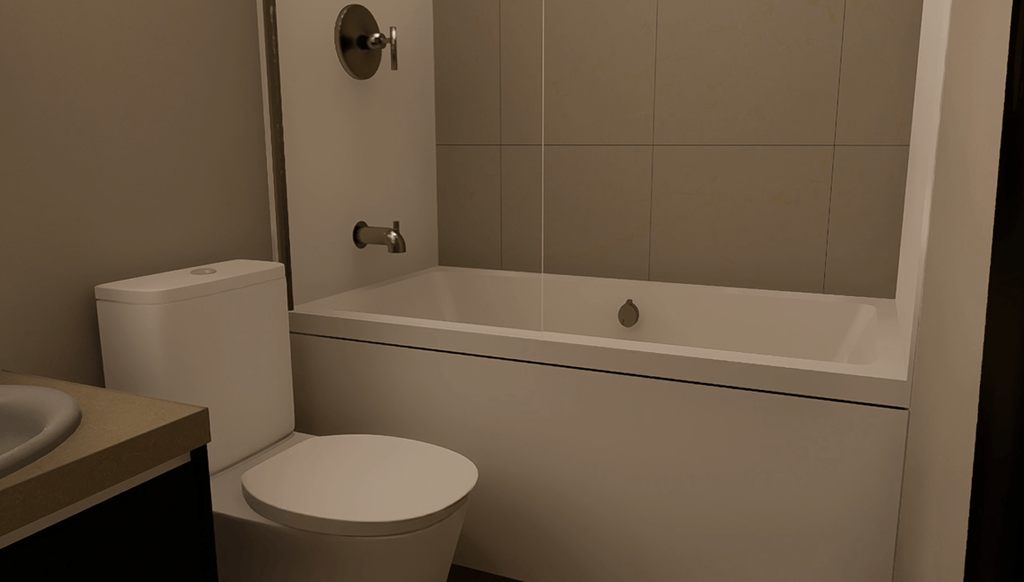 A white toilet sits next to a white bathtub in a bathroom.