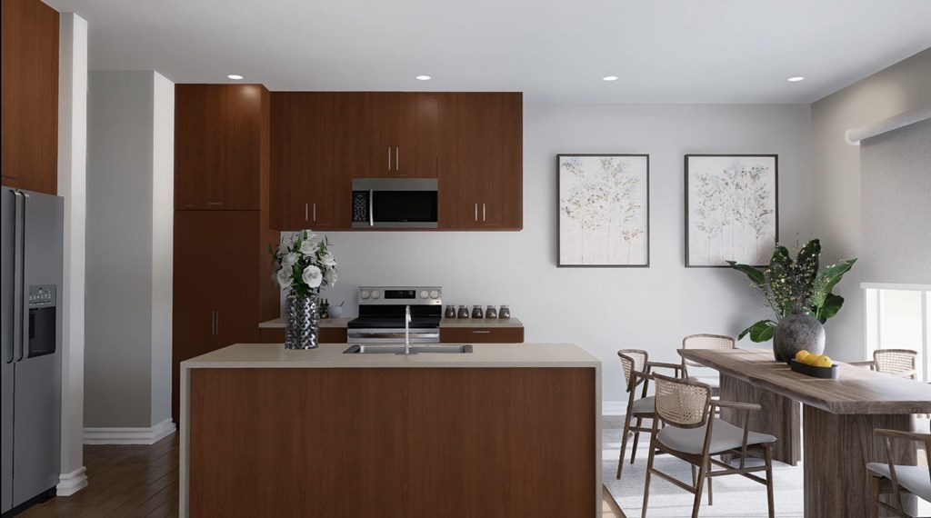 A kitchen with brown cabinets and a white countertop.