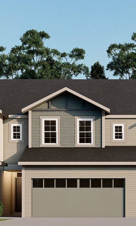 A house with a grey garage door and three windows.