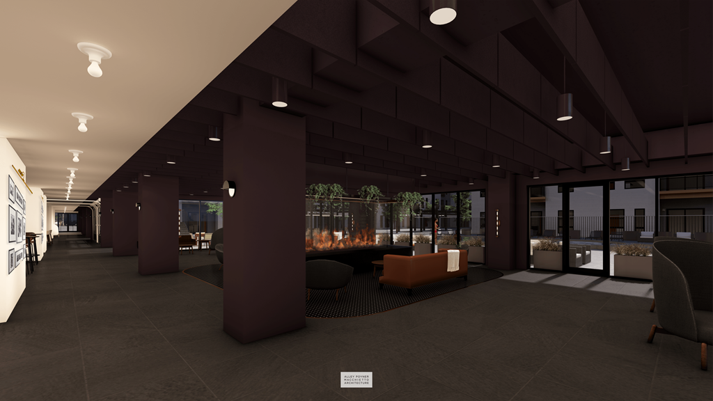 A modern interior space with dark flooring and a mix of seating and standing areas.