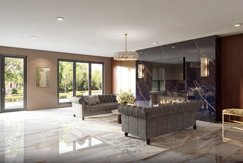 A modern living room with a grey sofa and a chandelier.