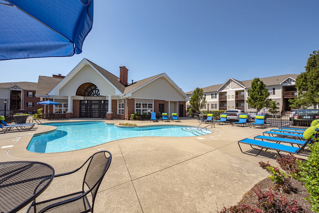 our apartments offer a swimming pool with chairs and umbrellas