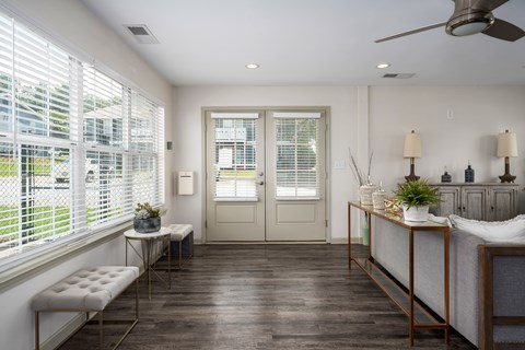 Community room with seating at Arbours at Victoria Place Prattville AL