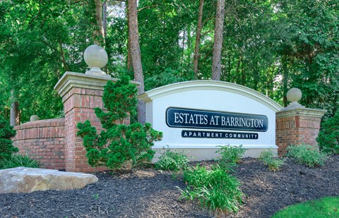 the sign at the entrance to estate at barrington apartments