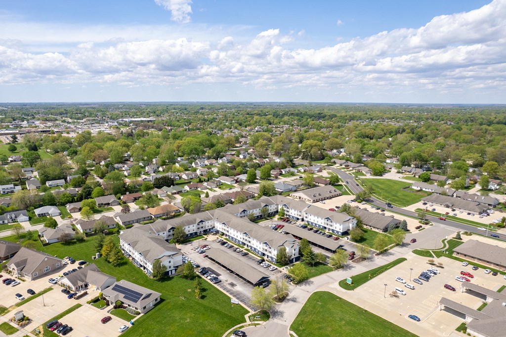 an aerial view of a neighborhood of houses in a suburban area