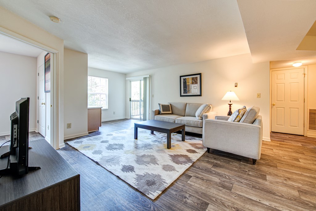 a living room with a couch and a coffee table