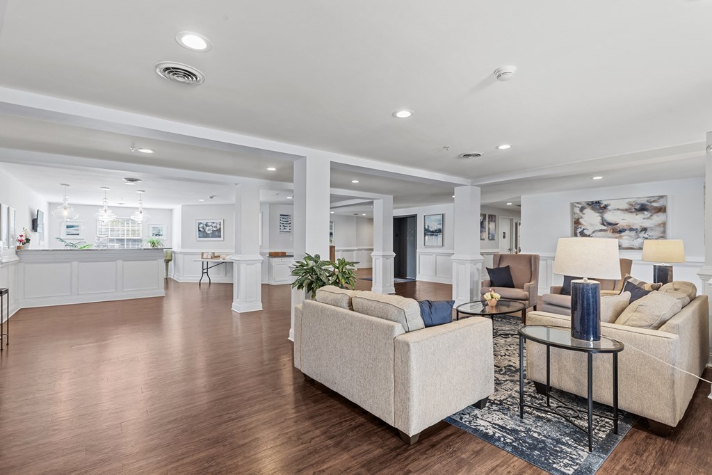 a living room with couches and a table