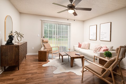 Bright living room with modern furnishings at Southwind Apartments in Richland, MS.