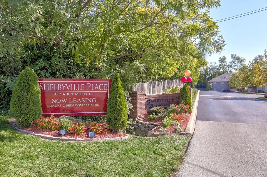 a sign place at the intersection of a street