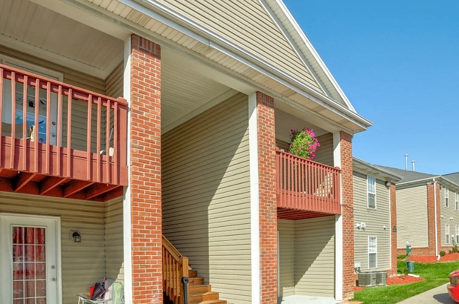 a house with a balcony on the side of it