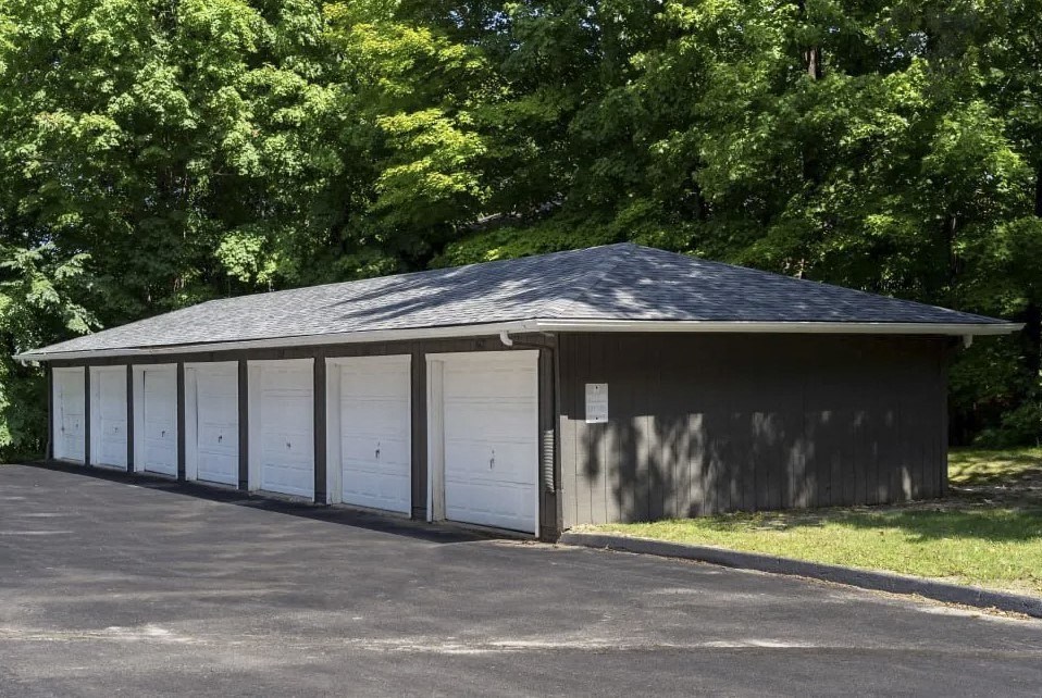 a small garage with white doors