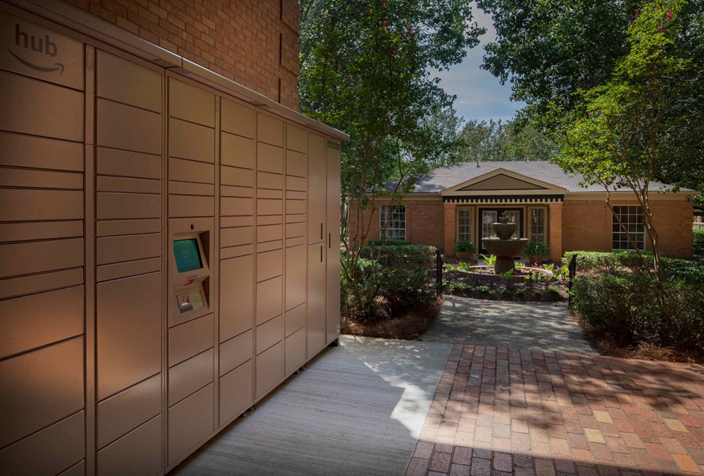 a house with a garage and a walkway in front of it