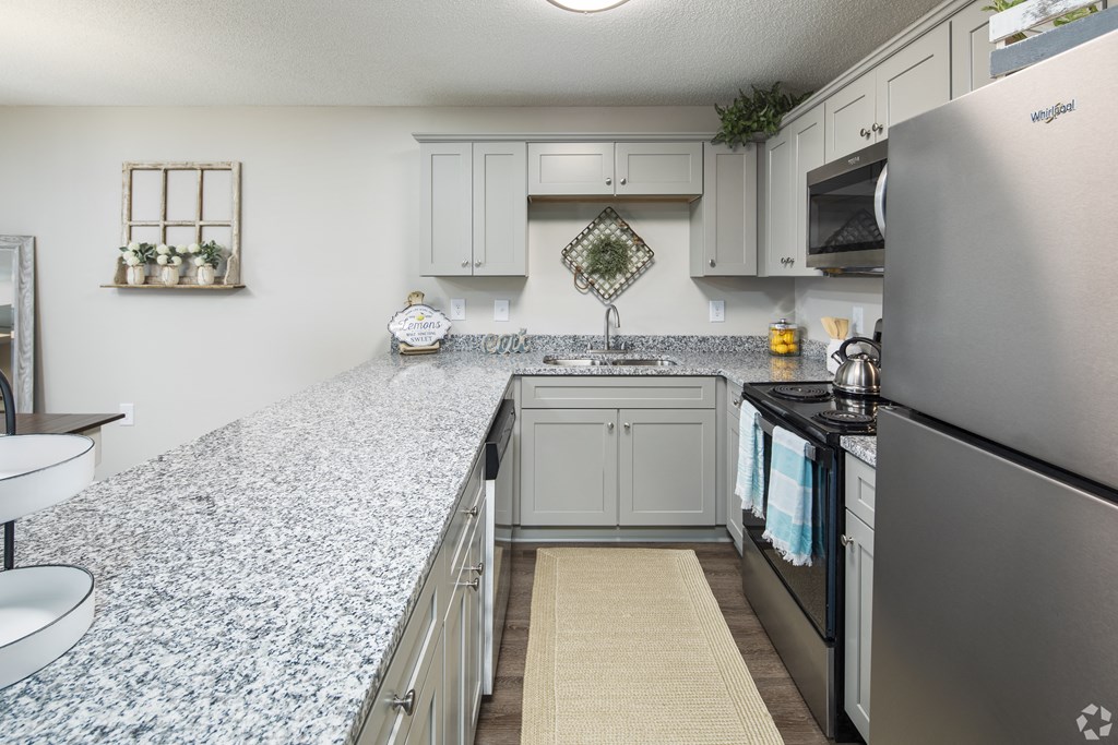 our apartments offer a modern kitchen with granite counter tops and stainless steel appliances