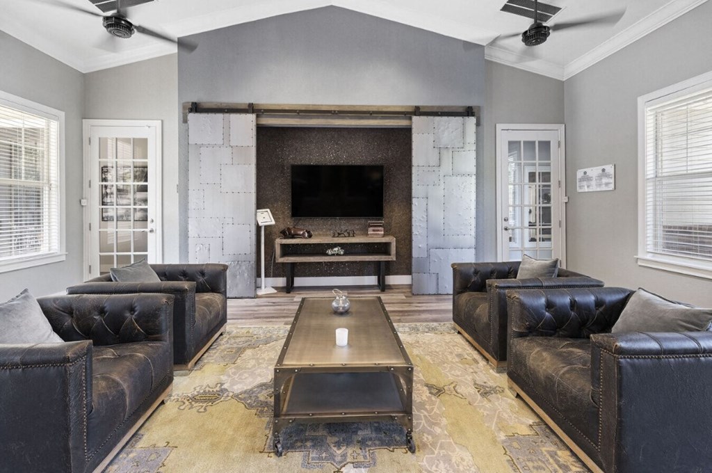 a living room with couches and a coffee table