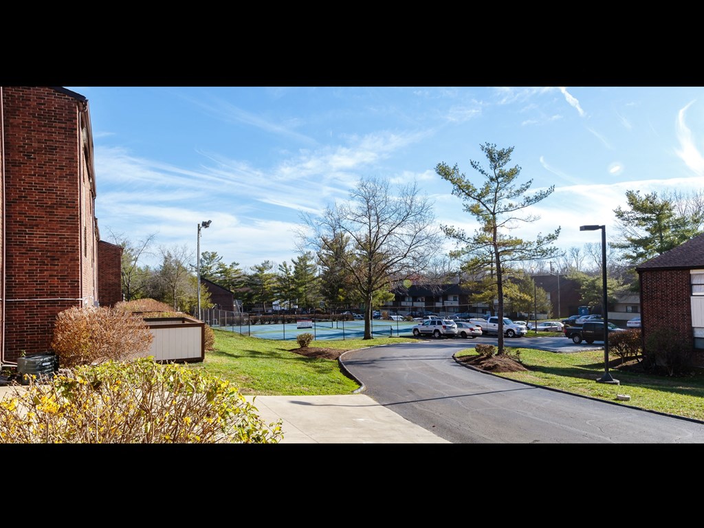 a view of the parking lot from the front of the building