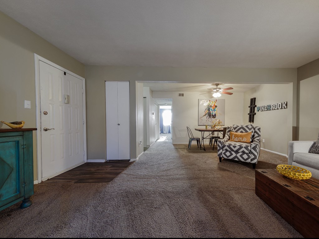 a living room with a couch and a chair