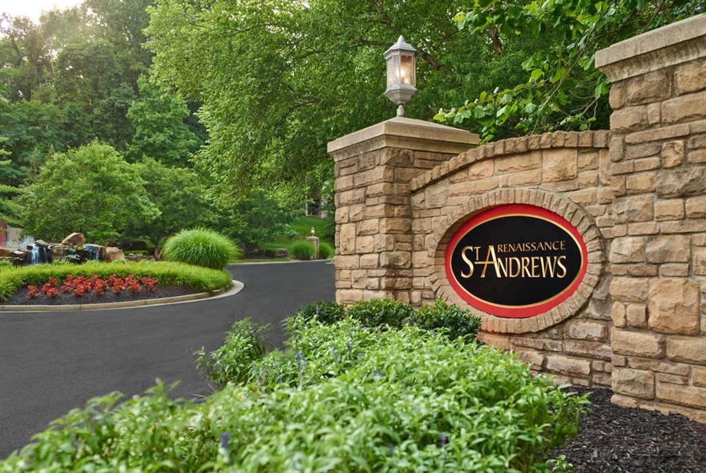 a sign on a stone wall at the entrance to a starbucks shareholders sign