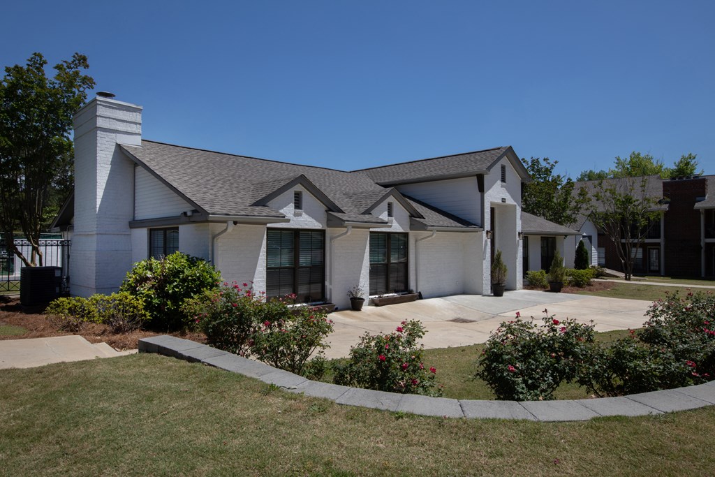 a white house with a gray roof