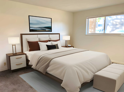 A bedroom with a large bed and a painting above it.