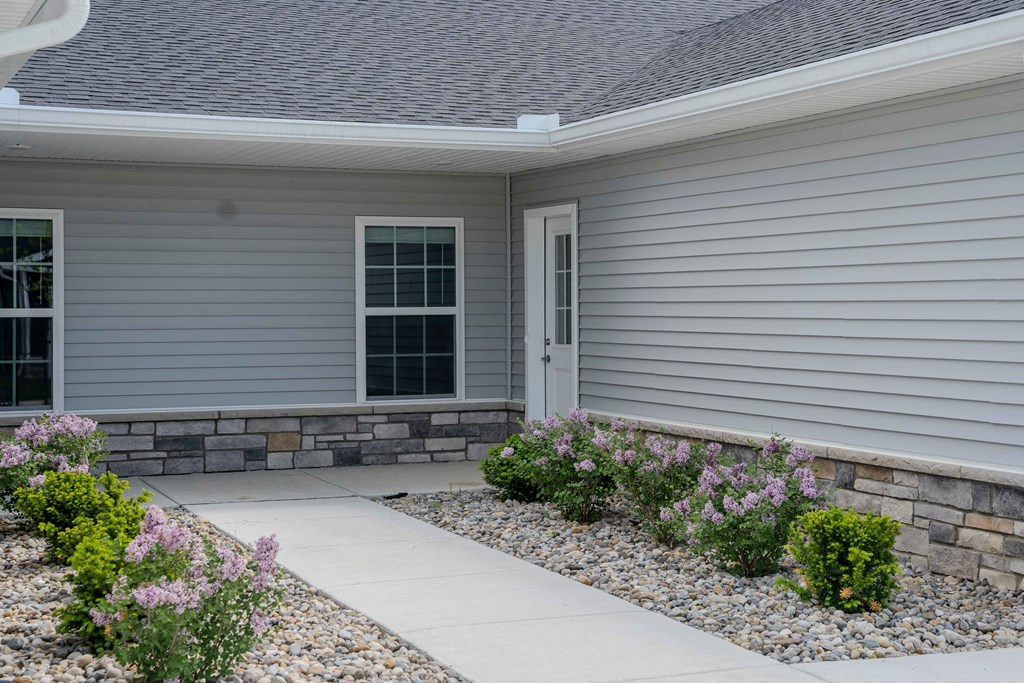 Front Walkway of a home at Chestnut Hills near Whitmore Lake.