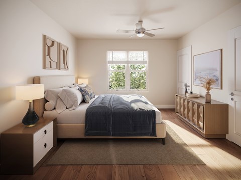 A bedroom with a bed, nightstand, and a ceiling fan. at Bretton Woods II Apartments, Columbus, OH, 43231