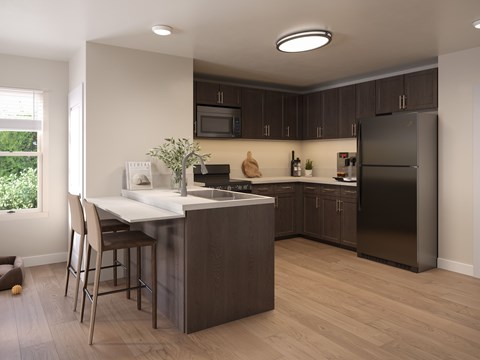 A modern kitchen with dark brown cabinets and a white island.
