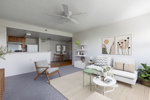 Open concept living room with modern decor at Landings of St. Andrew Apartments, New Port Richey, Florida