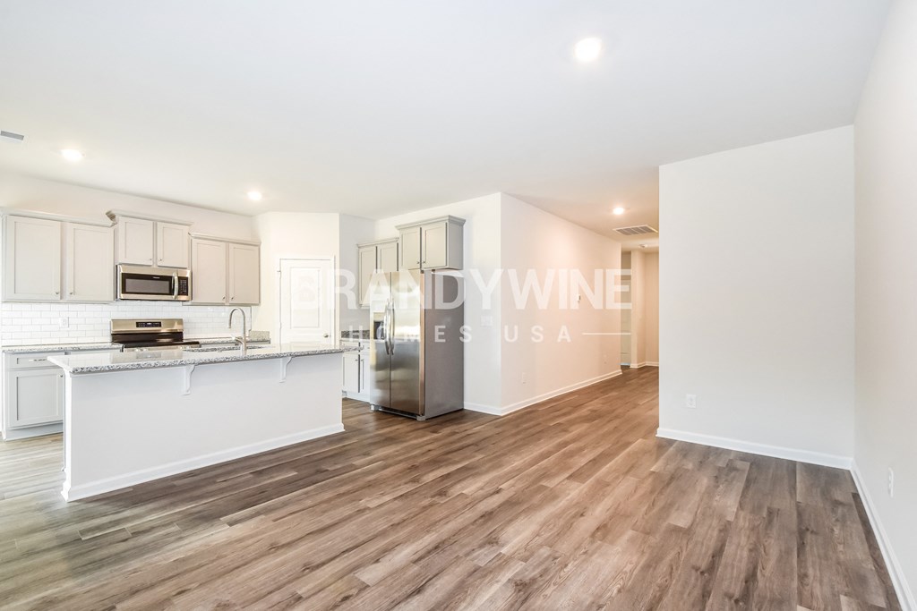 two bedroom apartment with a large living room and a kitchen