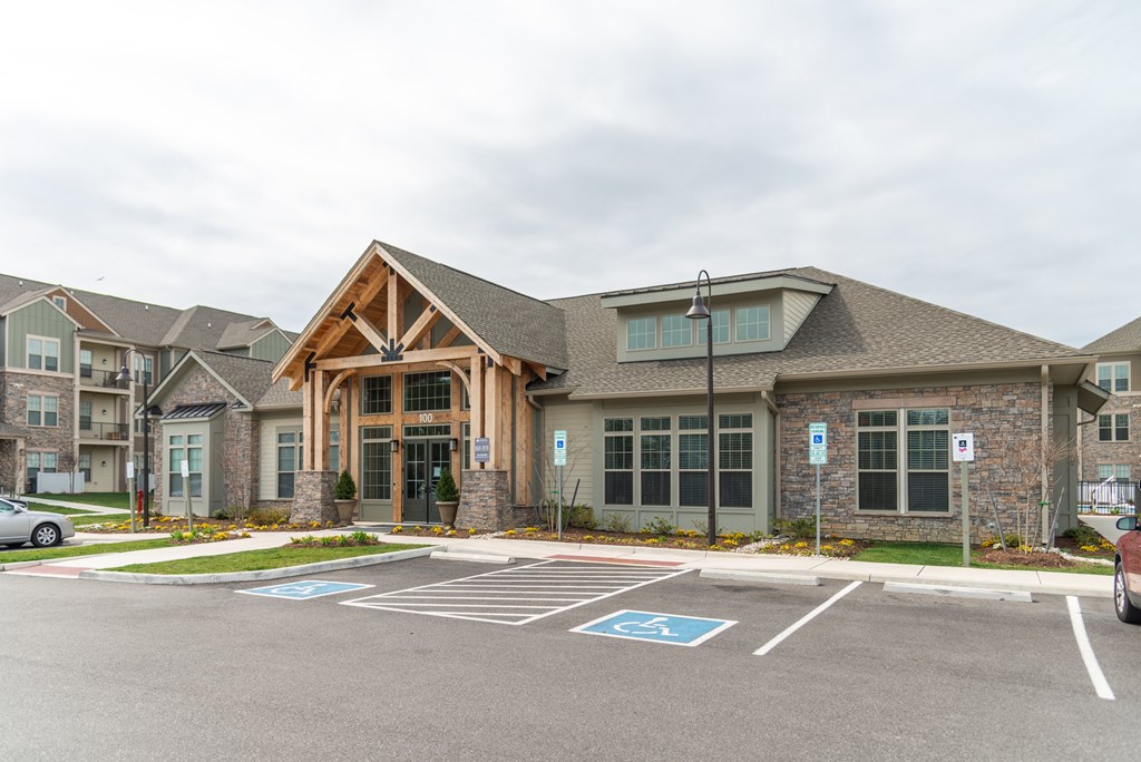 a building with a parking lot in front of it at The Whitworth, Williamsburg, 23185