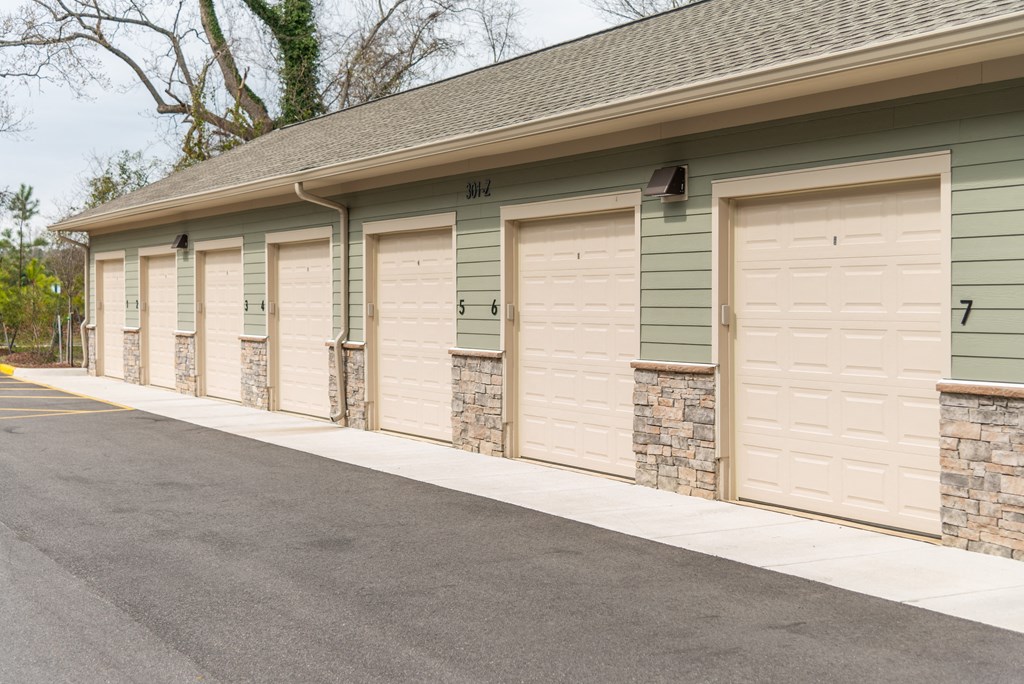 a row of garage doors in a row at The Whitworth, Virginia, 23185