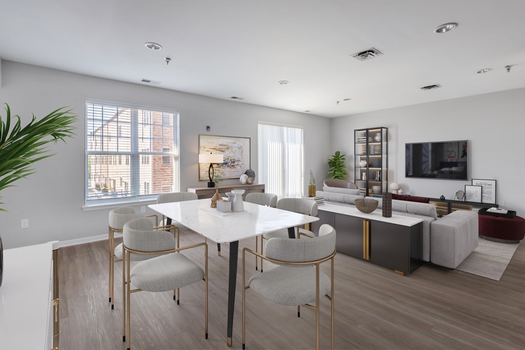 a living room and dining room with a white table and chairs