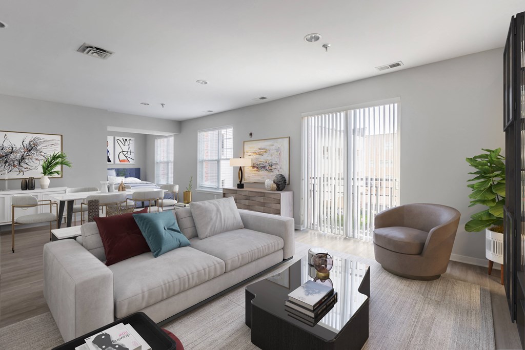 a living room with a white couch and a coffee table
