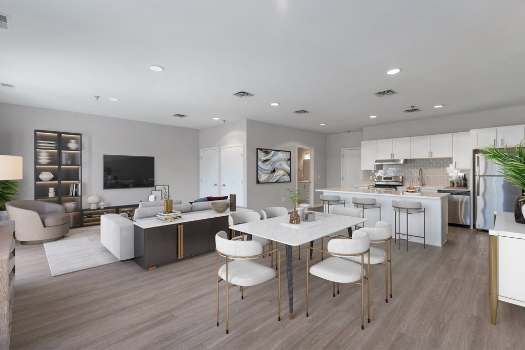 a living room and dining room with a table and chairs