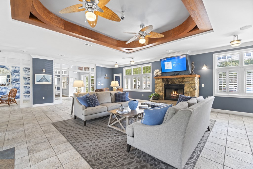 a living room with couches and a fireplace at Saltmeadow Bay, Virginia Beach, VA, 23451
