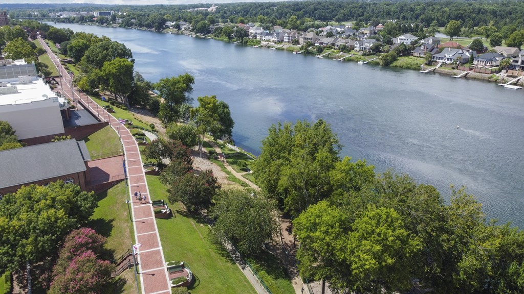 A river flows through a city with a bridge crossing over it