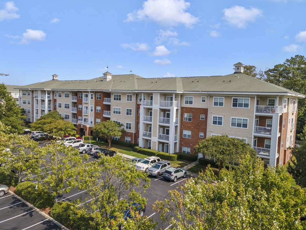an aerial view of an apartment building with a parking lot at Saltmeadow Bay, Virginia Beach, 23451