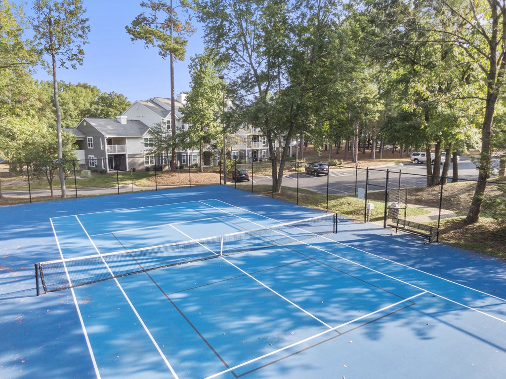 the tennis courts at the whispering winds apartments in pearland at Trails at Short Pump Apartments, Richmond, 23233