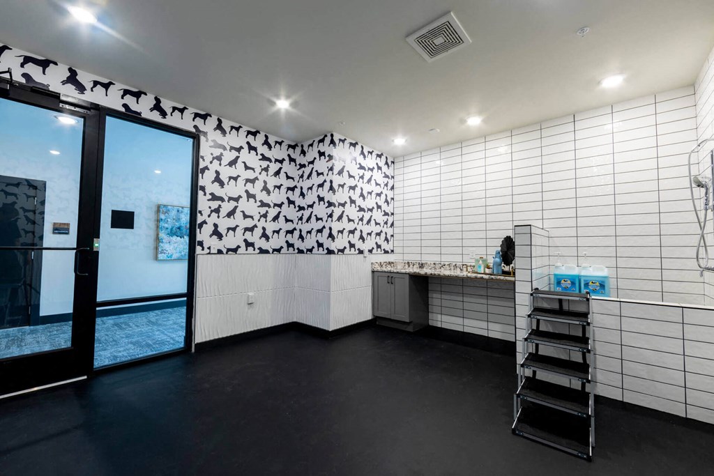 a room with white walls and black flooring at Tapestry West, Virginia