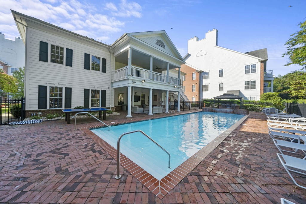 A large white house with a pool in the backyard  at Sterling Manor, VA, 23185