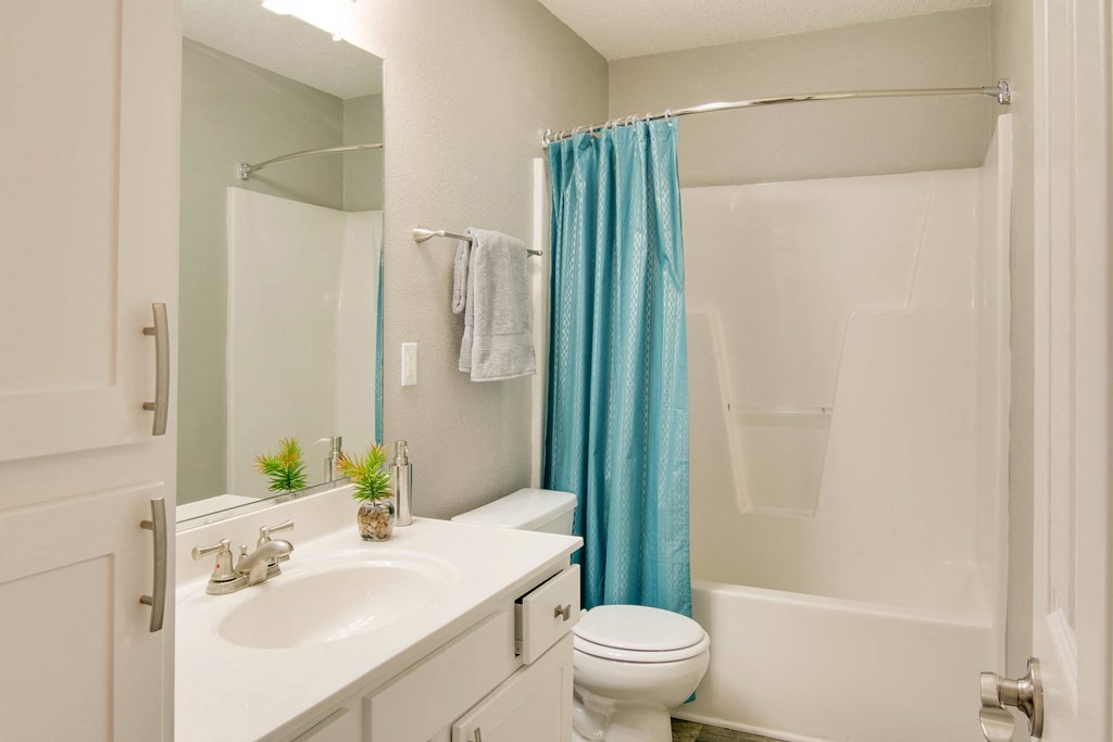 a bathroom with a sink toilet and a shower at Abbington Place Apartments, Greensboro , 27407